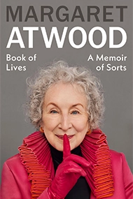 Cover of "Book of Lives: A Memoir of Sorts" by Margaret Atwood. Atwood, in a red outfit, holds a finger to her lips, suggesting secrecy.