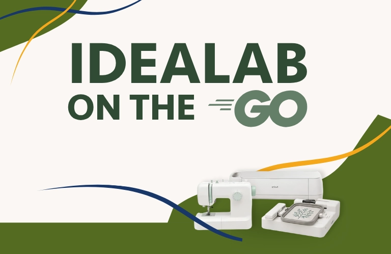The text IDEALAB ON THE GO is displayed prominently above three white crafting machines: a sewing machine, a cutting machine, and an embroidery machine.